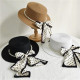 Елегнтна дамска сламена шапка в стилен дизайн с перли и пандела на точки ILF-13263 3