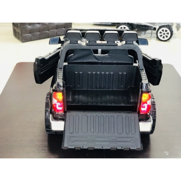 Акумулаторен джип Toyota Tundra двуместен с меки гуми, кожена седалка и отварящи се врати 11