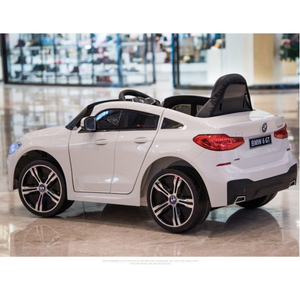 Акумулаторна кола BMW 6 GT с отварящи се врати 12V меки гуми