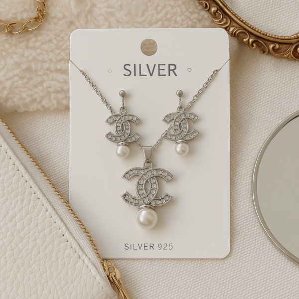 Луксозен сребрист комплект бижута с перли - колие и обеци 1