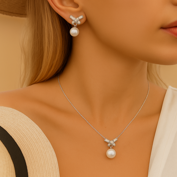 Комплект колие и обеци с перли и панделки