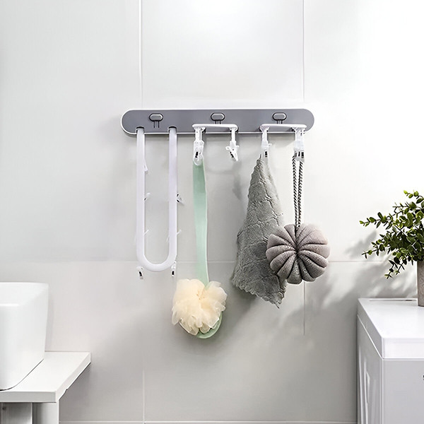 Самозалепваща се сгъваема стойка за сушене на дрехи с 24 щипки – компактно решение за малки пространства