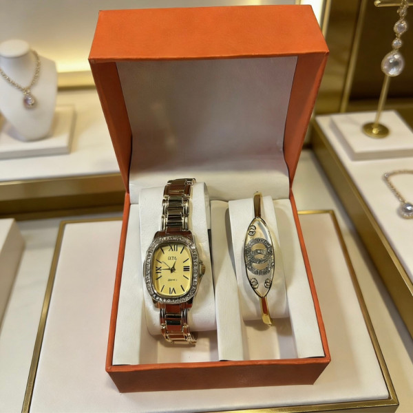 Луксозен дамски комплект: Елегантен часовник с кристали и стилна гривна в подаръчна кутия