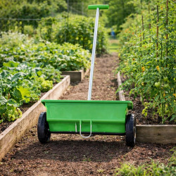 Ръчна градинска сеялка 6L с колела – разпръсквач за семена, торове, пясък и сол с 5-степенно регулиране