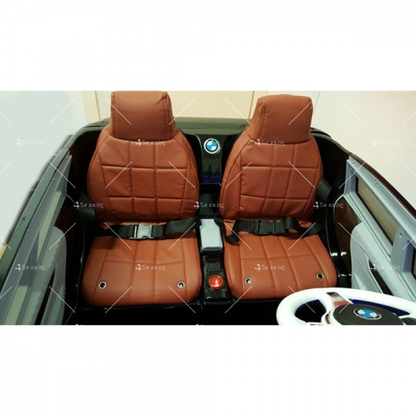 Двуместен акумулаторен джип BMW X7 с кожени седалки и вграден MP3 плеър 2