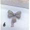 Колекция дамски брошки с атрактивен дизайн и декорация от ситни бели кристали Е18 11