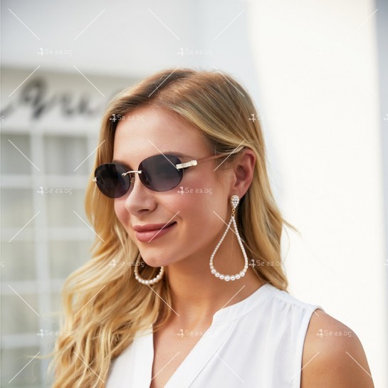 Дамски слънчеви очила в овална форма, без рамки